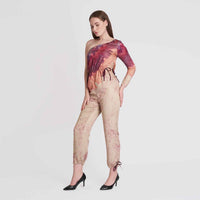 Angled front view of the one-shoulder ombre jumpsuit