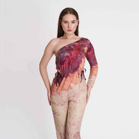 Front view of the one-shoulder ombre jumpsuit with a burgundy tie-dye top and beige speckled trousers
