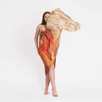 Model wearing the orange and gold ombre butterfly print scarf as a wrap dress