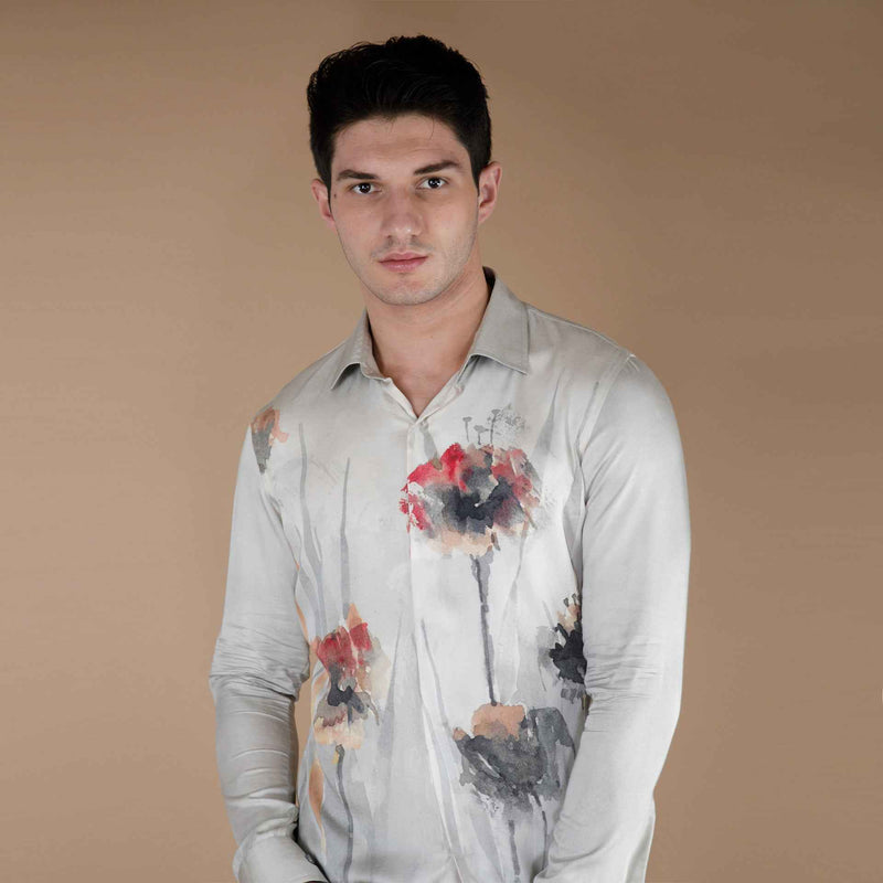 Front view of the grey shirt with a red and black floral watercolor print