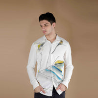Front view of the white shirt with a hand-painted bird and watercolor branch print