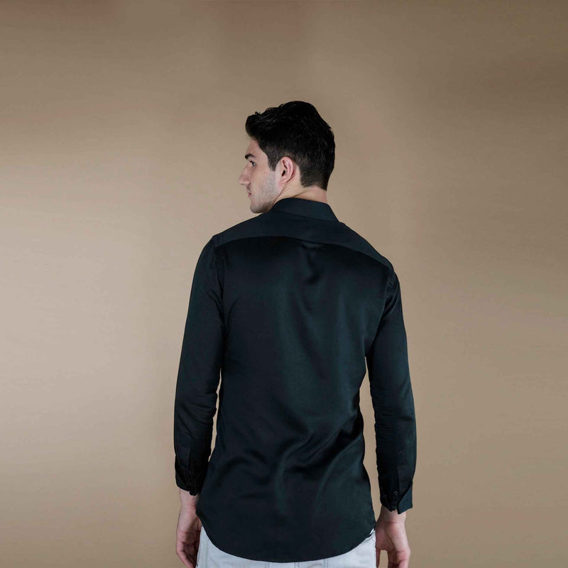 Back view of the solid dark green silk shirt