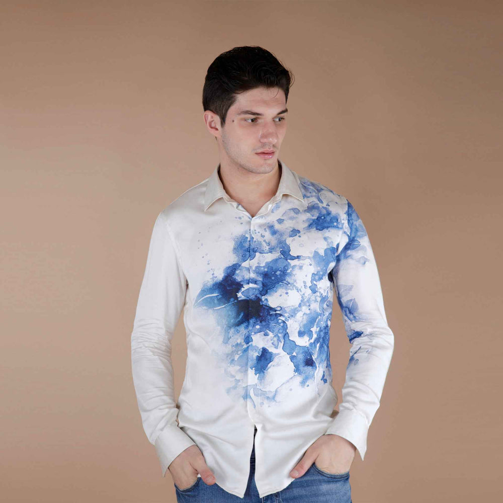 Front view of the cream shirt with a blue watercolor ink-wash print