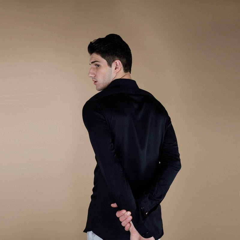 Back view of the solid black silk shirt