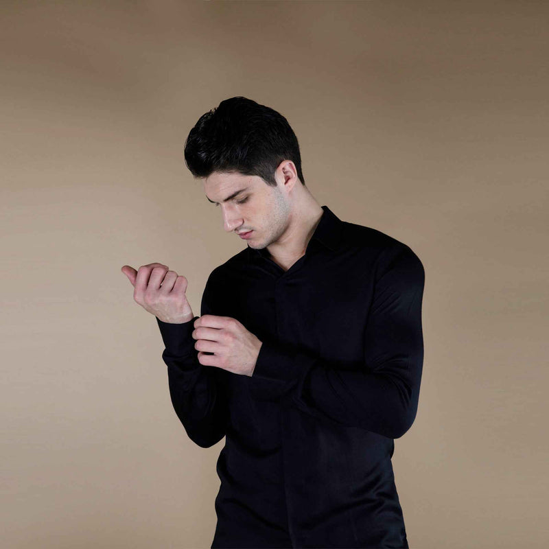 Front view of the solid black silk shirt with cuff detail