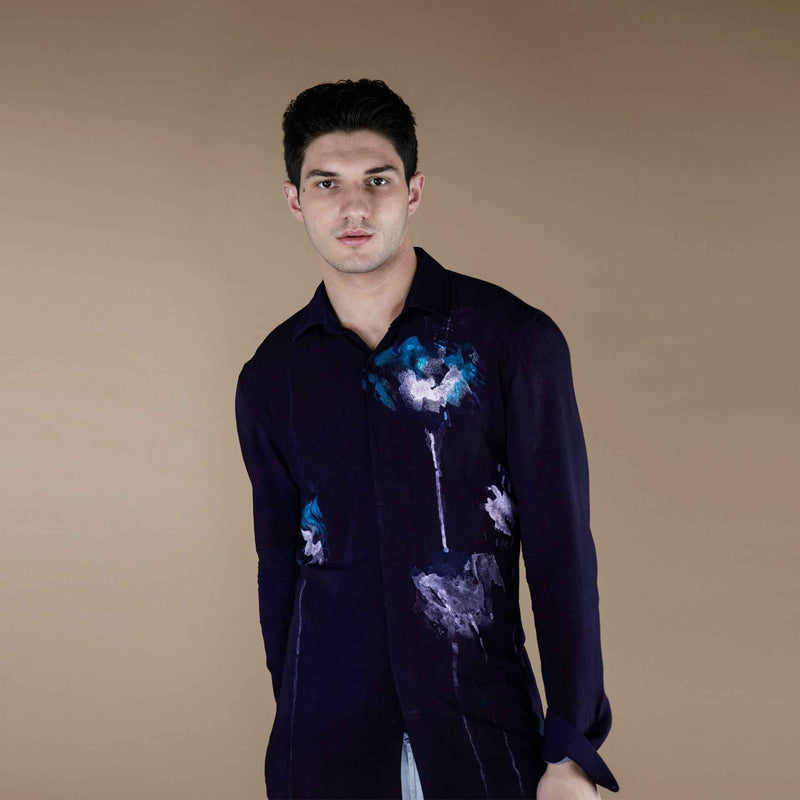 Front view of the deep purple shirt with an abstract multicolor print