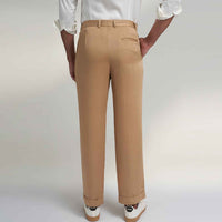 Back view of the beige pleated trousers