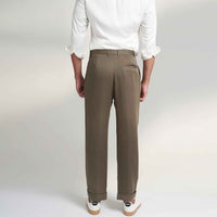 Back view of the olive green pleated trousers