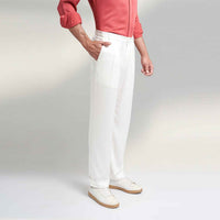 Side view of the off-white pleated trousers