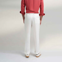 Back view of the off-white pleated trousers