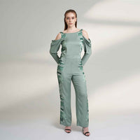 Front view of the sage green cold-shoulder jumpsuit with a cowl neck
