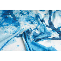Close-up of the blue and white splatter print scarf fabric, swirled
