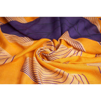 Close-up of the orange and purple striped scarf fabric, swirled