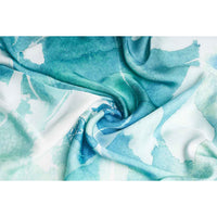 Close-up of the teal green watercolor print scarf fabric, gathered