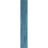 Close-up of the teal scarf fabric with dotted border detail