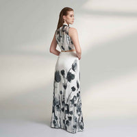Back view of the black and white floral print crop top and skirt