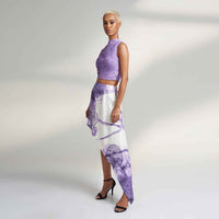 Side view of the pleated lilac purple crop top and asymmetric skirt