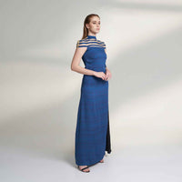 Side view of the long navy blue dress showing the side slit