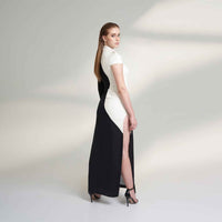 Back view of the long black and white colorblock dress