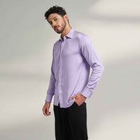 Side view of the solid lilac purple shirt with black trousers