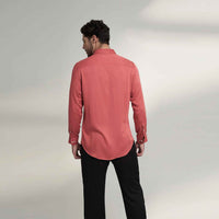 Back view of the solid crimson red shirt with black trousers