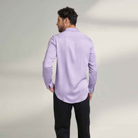 Back view of the solid lilac purple shirt with black trousers