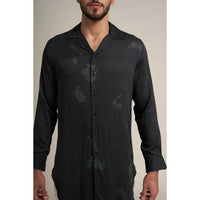 Close-up front view of the black and grey tonal print shirt fabric