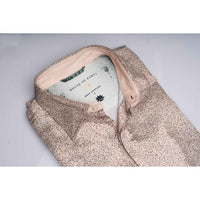 Close-up of the shirt collar showing the House of Parvi label and green interior lining