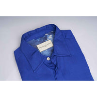 Close-up of the shirt collar showing the House of Parvi label and interior print lining