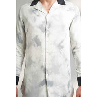 Close-up front view of the black and white tie-dye print shirt fabric