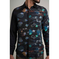 Close-up front view of the black floral watercolor print shirt fabric