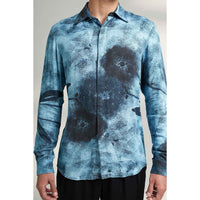 Close-up front view of the blue tie-dye print shirt fabric