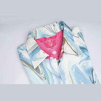 Close-up of the shirt collar showing the pink contrast lining