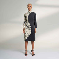 Front view of the colorblock midi dress with a black and cream splatter print panel