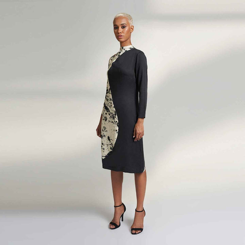 Angled front view of the colorblock midi dress with a splatter print panel
