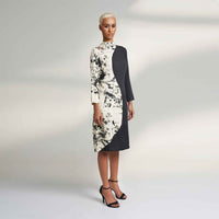 Side view of the colorblock midi dress showing the black and cream splatter print