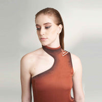 Close-up of the maroon dress neckline and shoulder cutout with ombre trim