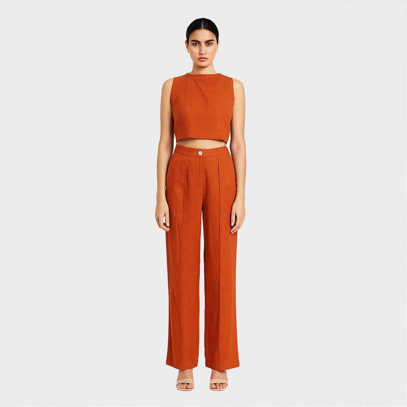 Front view of the burnt orange Lotus Stem Silk crop top and wide-leg trousers set